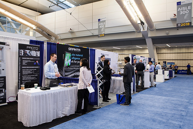 Attendees visiting exhibitor booths during IMECE2018