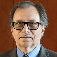 Carlos E. Koeneke, PhD