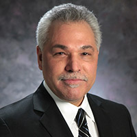 Dr. Christopher J. Freitas